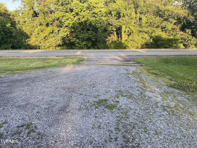 1959 Boones Creek Rd, Jonesborough, TN 37659 - view of asphalt road with a wooded view