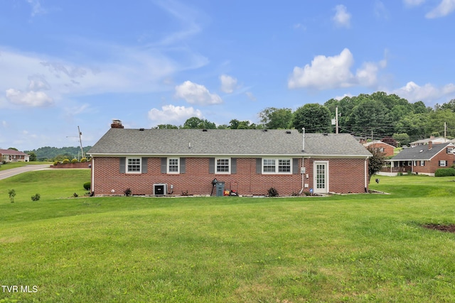 908 Middle Ave, Marion, VA 24354 - back of property featuring brick siding, a chimney, and a yard