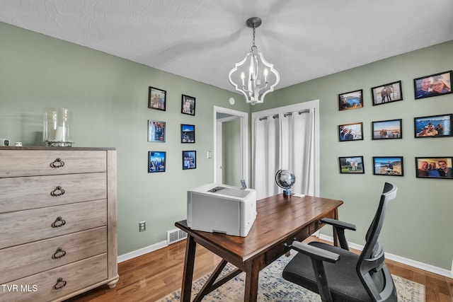 908 Middle Ave, Marion, VA 24354 - home office with a chandelier and wood finished floors