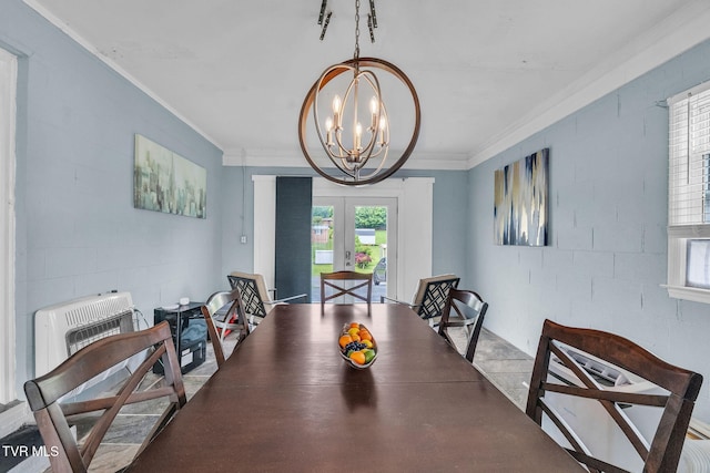 908 Middle Ave, Marion, VA 24354 - dining area with french doors, crown molding, a chandelier, concrete block wall, and heating unit
