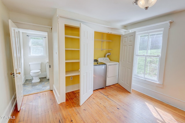 1330 Carroll Creek Rd, Gray, TN 37615 - laundry area with washer and dryer and light wood finished floors