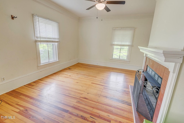 1330 Carroll Creek Rd, Gray, TN 37615 - unfurnished living room featuring light wood finished floors, ornamental molding, a tiled fireplace, and ceiling fan