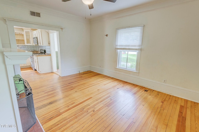 1330 Carroll Creek Rd, Gray, TN 37615 - spare room featuring ceiling fan, light wood finished floors, and ornamental molding