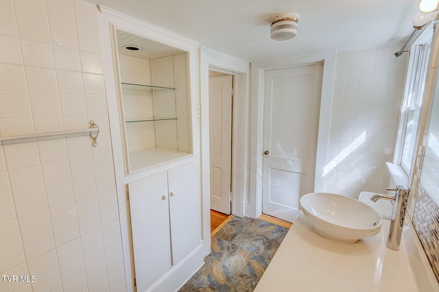 1330 Carroll Creek Rd, Gray, TN 37615 - bathroom with vanity and tile walls