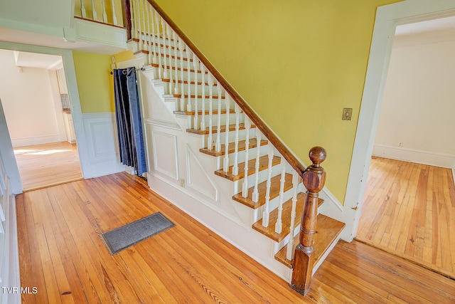 1330 Carroll Creek Rd, Gray, TN 37615 - stairs featuring wood-type flooring and wainscoting