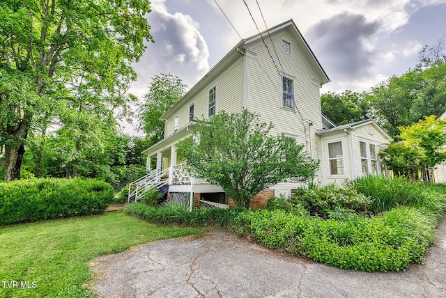 1330 Carroll Creek Rd, Gray, TN 37615 - view of property exterior with a yard, stairs, and covered porch