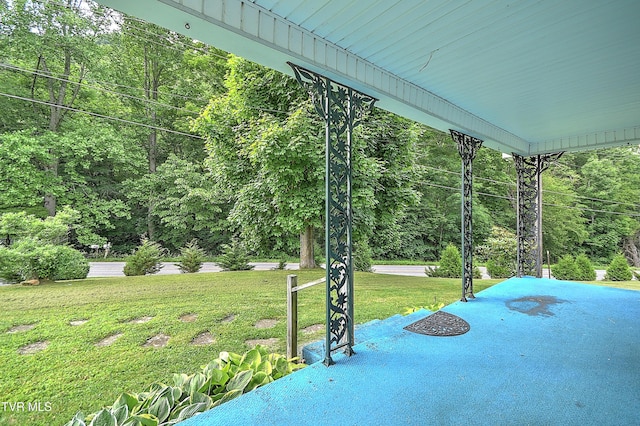 325 Cove Creek Rd, Roan Mountain, TN 37687 - view of patio featuring a forest view