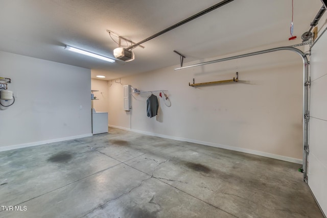 603 Stratford Ct Unit 603, Gray, TN 37615 - garage featuring a garage door opener and baseboards