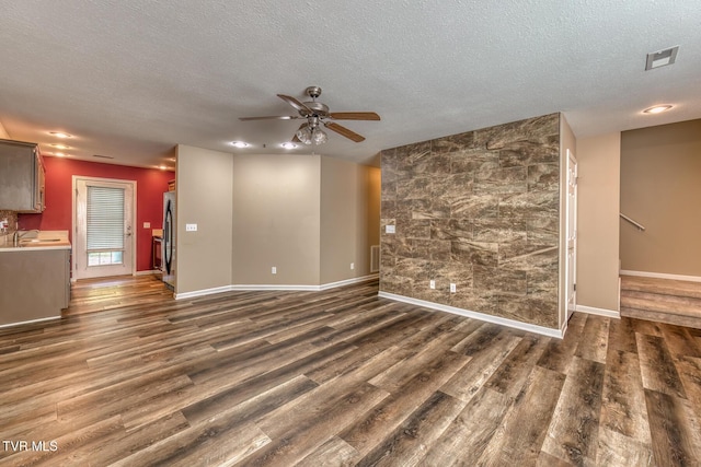 603 Stratford Ct Unit 603, Gray, TN 37615 - unfurnished living room featuring a ceiling fan, dark wood finished floors, and a textured ceiling