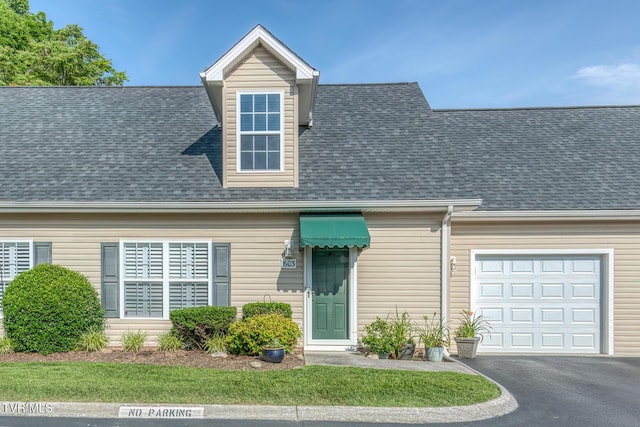 603 Stratford Ct Unit 603, Gray, TN 37615 - new england style home featuring an attached garage, a shingled roof, and driveway