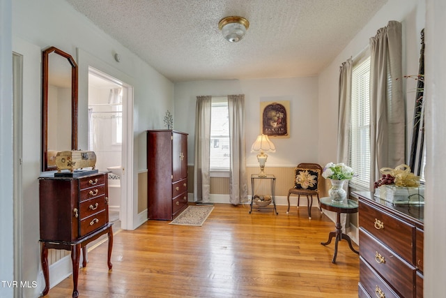 1634 Highland St, Kingsport, TN 37664 - foyer with plenty of natural light, light wood-type flooring, and a textured ceiling