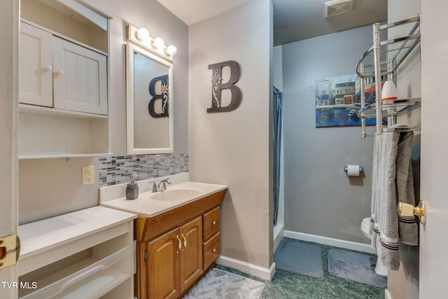 1634 Highland St, Kingsport, TN 37664 - full bath with vanity, a stall shower, and tasteful backsplash