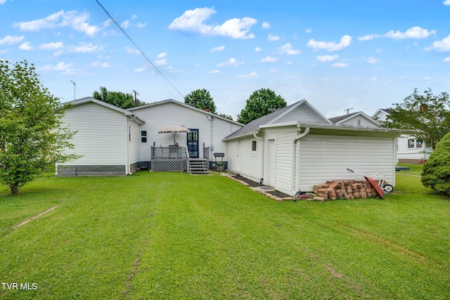 1634 Highland St, Kingsport, TN 37664 - rear view of property with a lawn and a deck