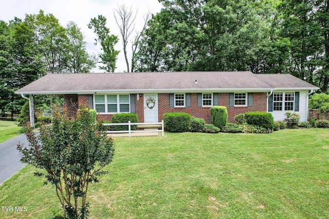 126 Poplar Hill Dr, Johnson City, TN 37604 - ranch-style home with brick siding, a front lawn, and driveway