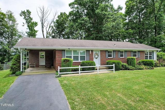 126 Poplar Hill Dr, Johnson City, TN 37604 - ranch-style house featuring driveway, brick siding, and an attached carport