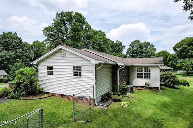 126 Poplar Hill Dr, Johnson City, TN 37604 - rear view of house with crawl space, a yard, and a shingled roof