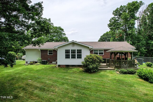 126 Poplar Hill Dr, Johnson City, TN 37604 - rear view of house featuring a gazebo, brick siding, and a deck