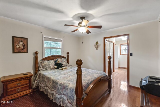 126 Poplar Hill Dr, Johnson City, TN 37604 - bedroom with wood finished floors, ornamental molding, and ceiling fan