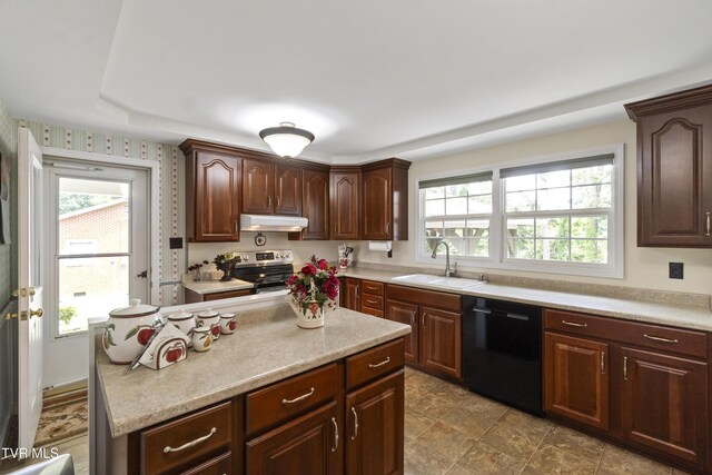 126 Poplar Hill Dr, Johnson City, TN 37604 - kitchen featuring black dishwasher, under cabinet range hood, range with electric stovetop, light countertops, and a kitchen island