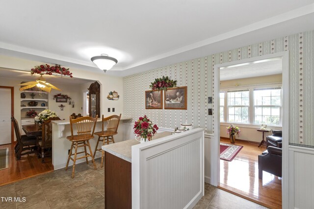 126 Poplar Hill Dr, Johnson City, TN 37604 - kitchen with wallpapered walls, light countertops, and wood finished floors