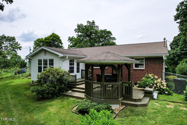 126 Poplar Hill Dr, Johnson City, TN 37604 - rear view of house featuring a gazebo, a deck, brick siding, and roof with shingles