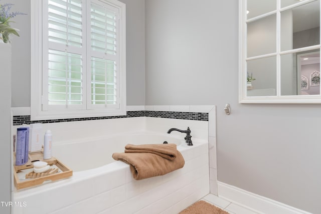 1124 Martingale Sq, Kingsport, TN 37663 - bathroom with healthy amount of natural light and a bath