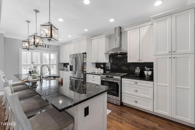 1124 Martingale Sq, Kingsport, TN 37663 - kitchen with appliances with stainless steel finishes, wall chimney range hood, recessed lighting, a chandelier, and white cabinetry