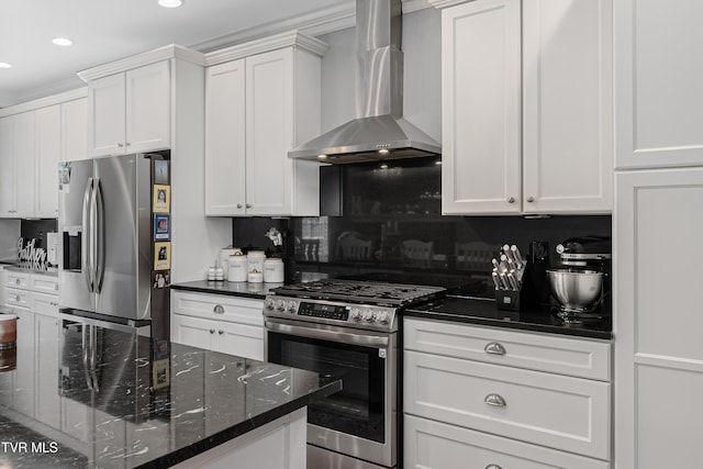 1124 Martingale Sq, Kingsport, TN 37663 - kitchen with wall chimney range hood, appliances with stainless steel finishes, white cabinetry, recessed lighting, and tasteful backsplash