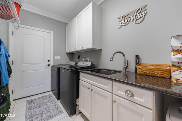 1124 Martingale Sq, Kingsport, TN 37663 - washroom featuring independent washer and dryer, crown molding, cabinet space, and light tile patterned floors