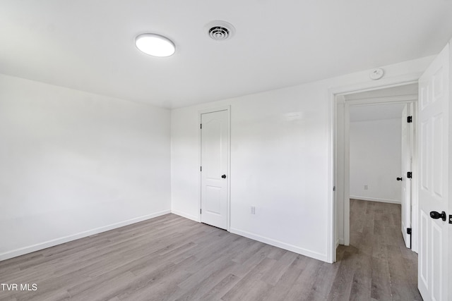 265 Hightop Rd, Midway, TN 37809 - unfurnished bedroom featuring wood finished floors and a closet