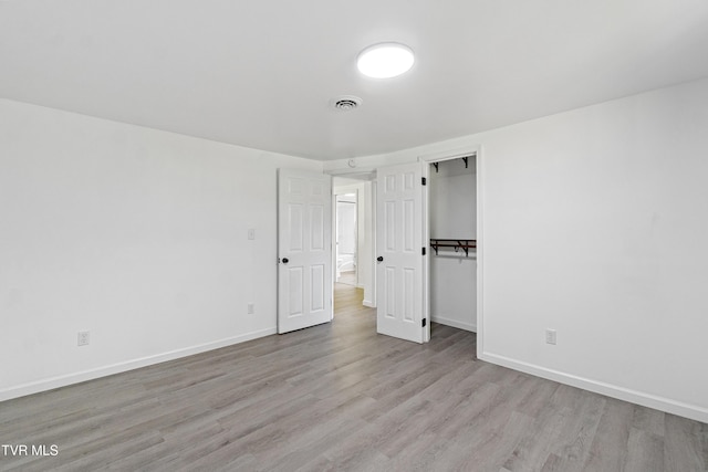 265 Hightop Rd, Midway, TN 37809 - unfurnished bedroom with wood finished floors and a closet