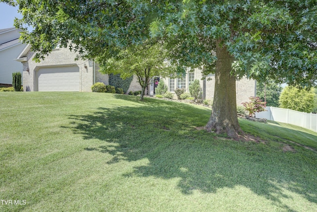 305 Emerald Chase Cir, Johnson City, TN 37615 - view of yard featuring a garage and driveway