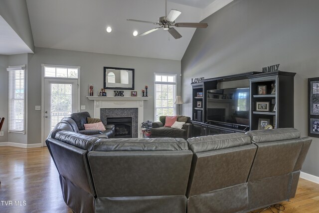 305 Emerald Chase Cir, Johnson City, TN 37615 - living room with a fireplace, wood finished floors, ceiling fan, and high vaulted ceiling