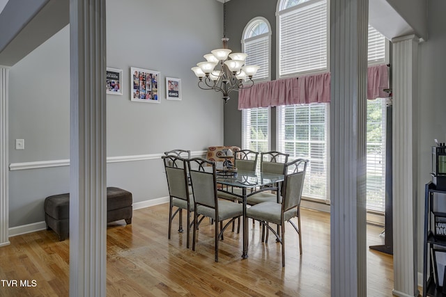 305 Emerald Chase Cir, Johnson City, TN 37615 - dining space with a chandelier, light wood-style floors, and a high ceiling