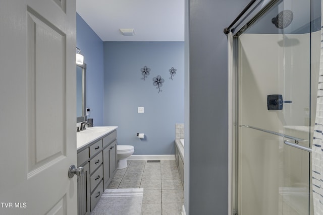 305 Emerald Chase Cir, Johnson City, TN 37615 - bathroom with a shower stall, vanity, a bath, and tile patterned floors