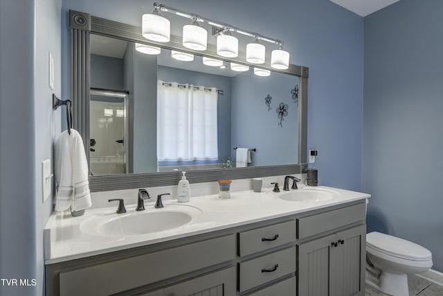 305 Emerald Chase Cir, Johnson City, TN 37615 - full bath featuring double vanity, a shower with door, and tile patterned floors