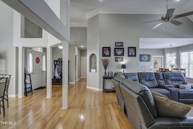 305 Emerald Chase Cir, Johnson City, TN 37615 - living area featuring light wood-style flooring, ceiling fan, ornamental molding, and a high ceiling