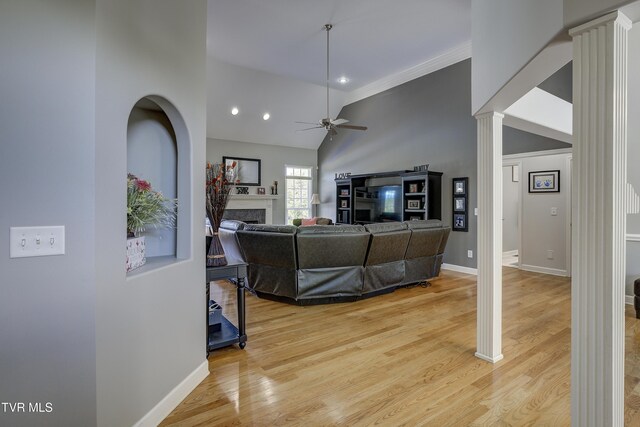 305 Emerald Chase Cir, Johnson City, TN 37615 - living area with decorative columns, a ceiling fan, a fireplace, light wood-style flooring, and recessed lighting