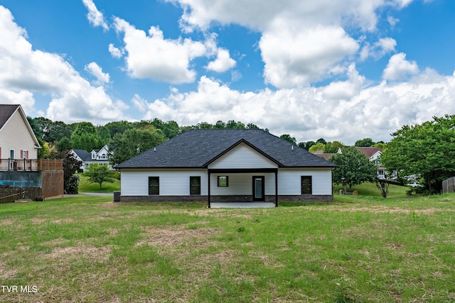 1308 Walnut Grove Rd, Jonesborough, TN 37659 - back of house featuring a lawn, a patio area, and a shingled roof