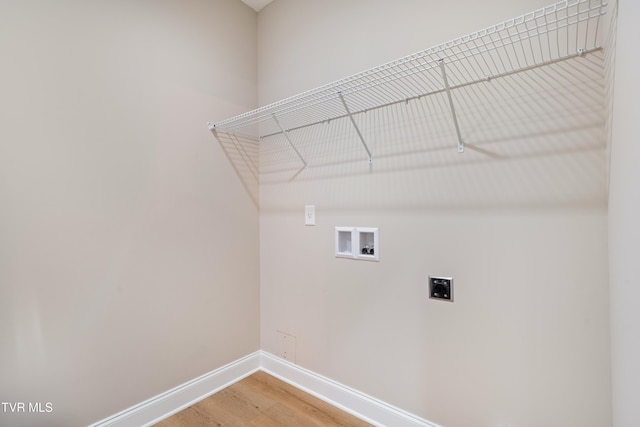 1308 Walnut Grove Rd, Jonesborough, TN 37659 - laundry area featuring electric dryer hookup, light wood-style floors, and washer hookup