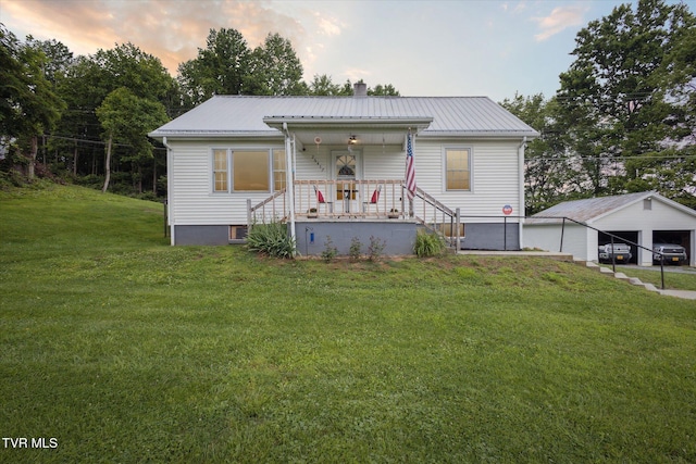 26417 Old Saltworks Rd, Abingdon, VA 24210 - view of front of property with a porch, a chimney, a front yard, a metal roof, and a carport