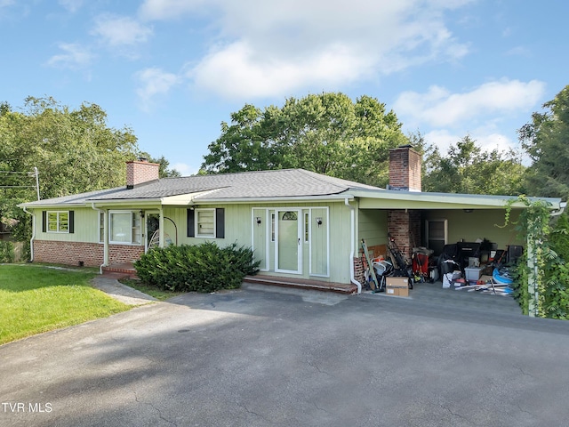 206 Cloverdale Pl, Bristol, TN 37620 - single story home featuring a chimney, brick siding, and a front lawn
