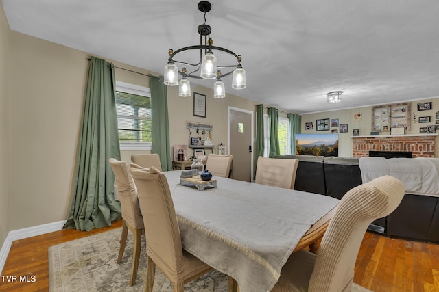 206 Cloverdale Pl, Bristol, TN 37620 - dining area featuring plenty of natural light, a chandelier, and wood finished floors