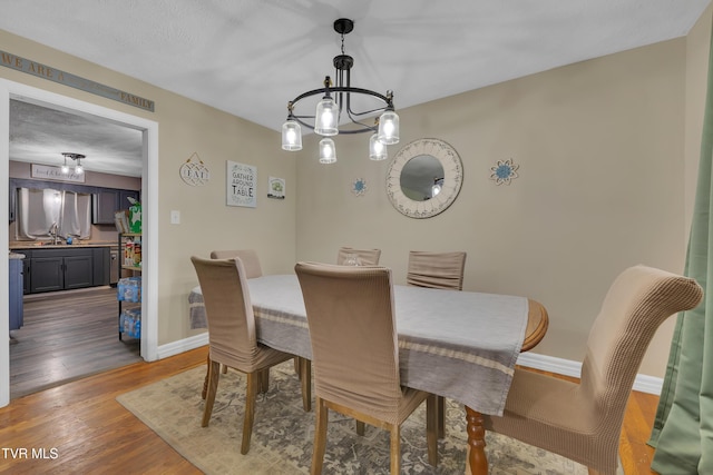 206 Cloverdale Pl, Bristol, TN 37620 - dining space featuring a chandelier and wood finished floors