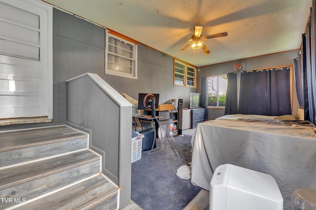 206 Cloverdale Pl, Bristol, TN 37620 - bedroom with wood walls and a ceiling fan