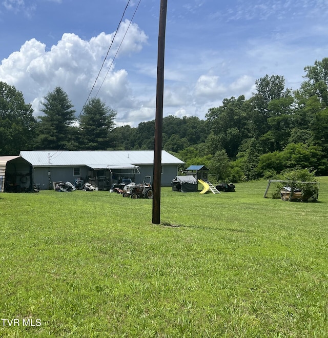3911 Tate Springs Rd, Big Stone Gap, VA 24219 - view of grassy yard featuring a detached carport