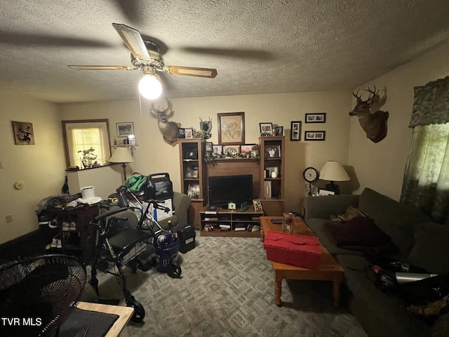 3911 Tate Springs Rd, Big Stone Gap, VA 24219 - living room featuring carpet flooring, a ceiling fan, and a textured ceiling