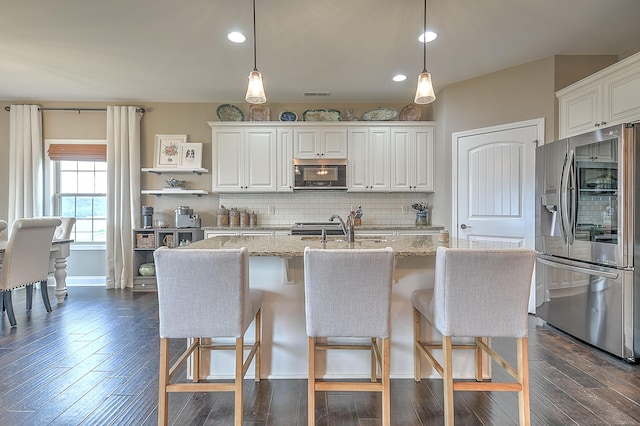 3309 Murrayfield Way, Kingsport, TN 37664 - kitchen with stainless steel fridge, backsplash, dark wood-type flooring, white cabinetry, and recessed lighting