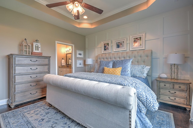 3309 Murrayfield Way, Kingsport, TN 37664 - bedroom featuring crown molding, dark wood-style floors, a tray ceiling, ensuite bath, and ceiling fan