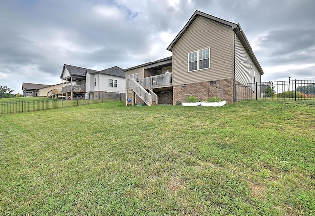 3309 Murrayfield Way, Kingsport, TN 37664 - rear view of property with stairs, a fenced backyard, brick siding, and a deck